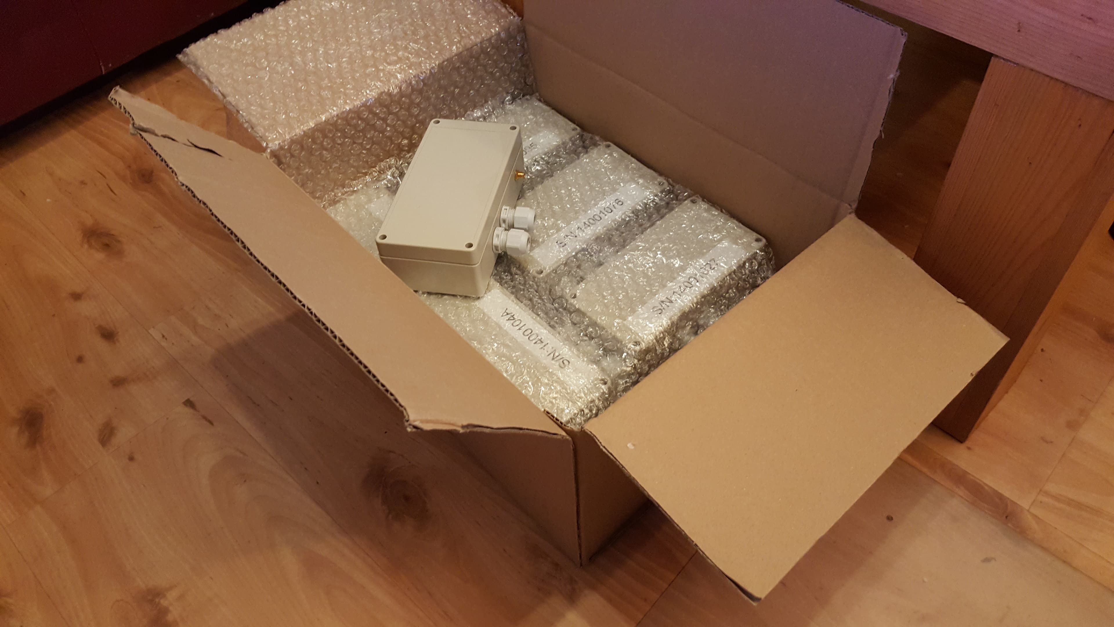 Serial-numbered units individually wrapped and packed for shipping